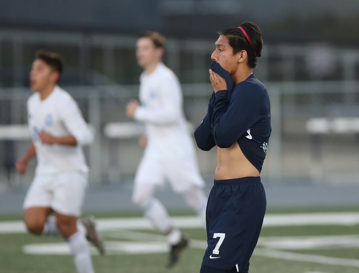 Newport Harbor’s Jimmy Castillo (7) reacts after La Habra scores a goal in the second round of the CIF Southern Section Division 2 playoffs on Friday.