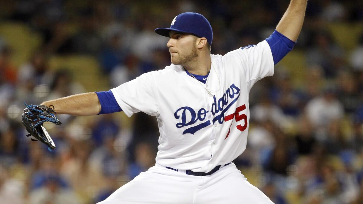 Dodgers reliever Paco Rodriguez delivers a pitch during a game against the San Francisco Giants in June 2013.