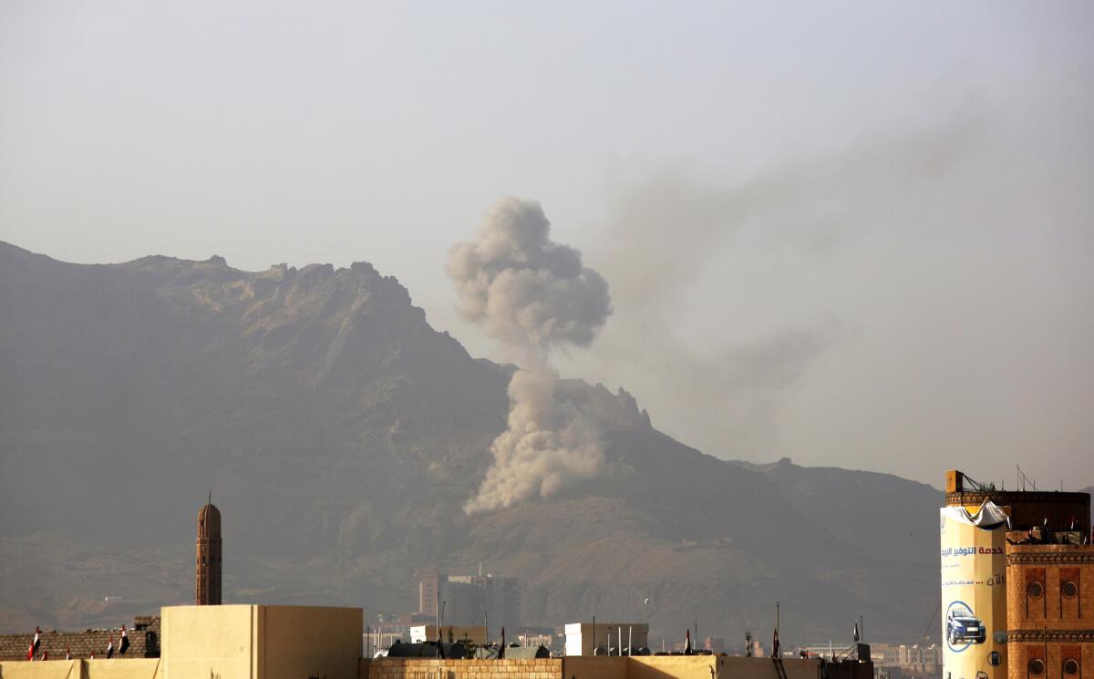 Smoke rises after a Saudi-led airstrike hit a site believed to be one of the largest weapons depots on the outskirts of Yemen's capital, Sana, on Wednesday.