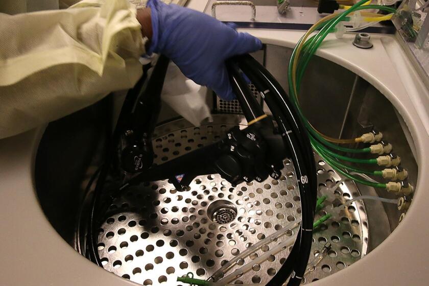 LOS ANGELES, CA, MONDAY, NOVEMBER 9, 2015 - An Olympus duodenoscope is cleaned in the GI unit at LA County/USC Medical Center. (Robert Gauthier/Los Angeles Times)