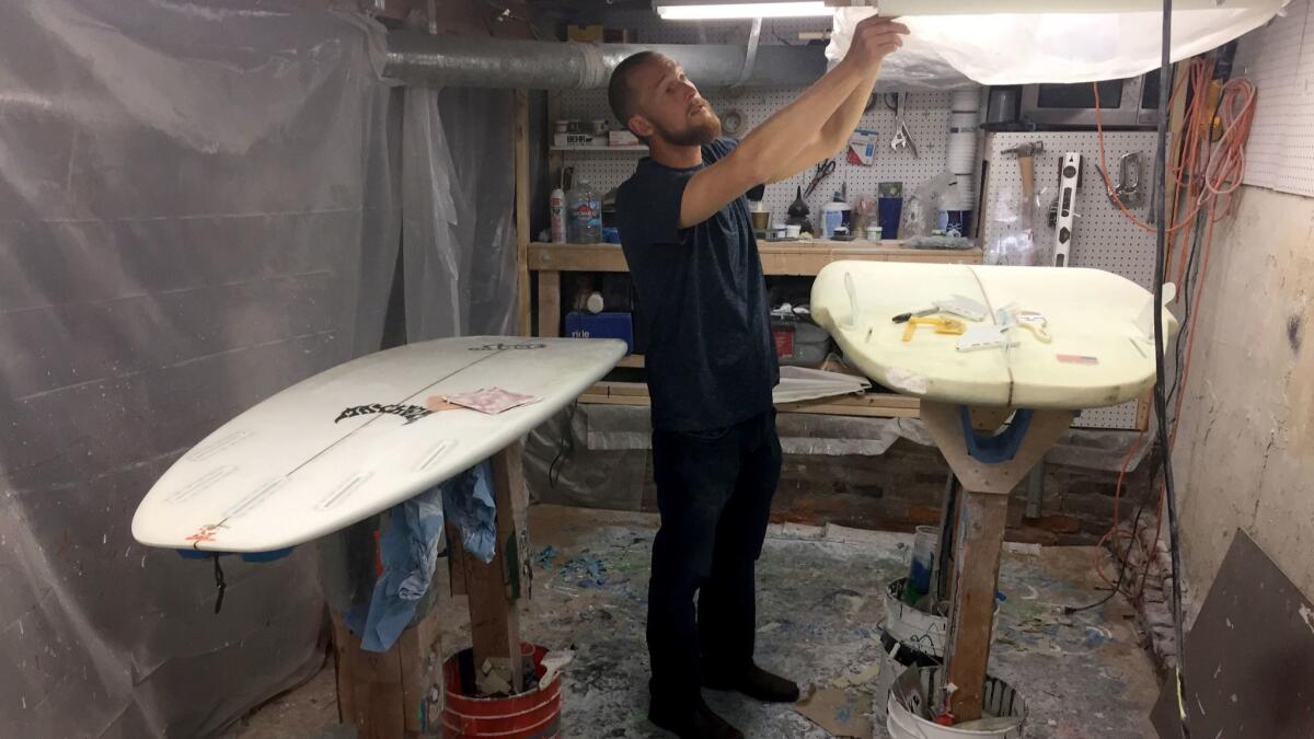 Dan Setzke makes custom surfboards for surfing rivers.