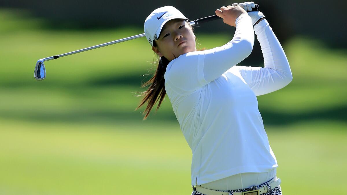 Angel Yin, who is in the final of the U.S. Girls' Junior golf championship, plays a shot during the LPGA's Kraft Nabisco Championship on April 3, 2014.