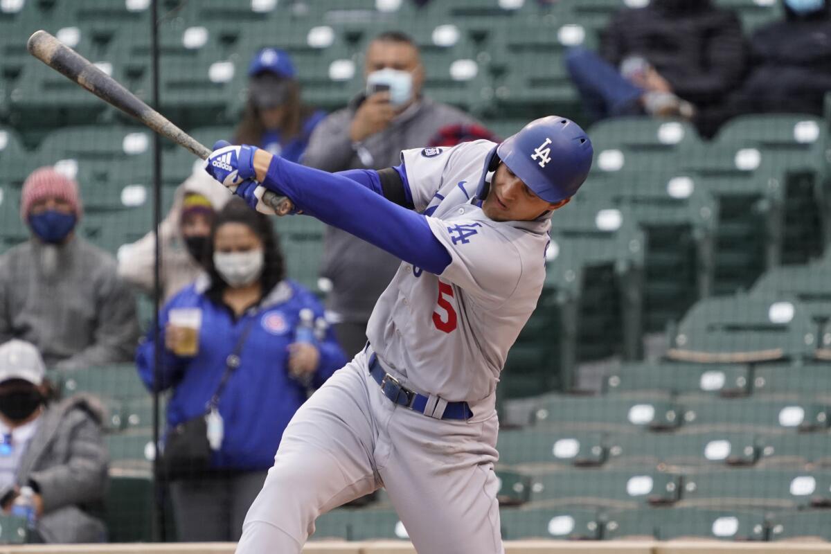 Dodgers shortstop Corey Seager swings at a pitch during a loss to the Chicago Cubs on Tuesday.