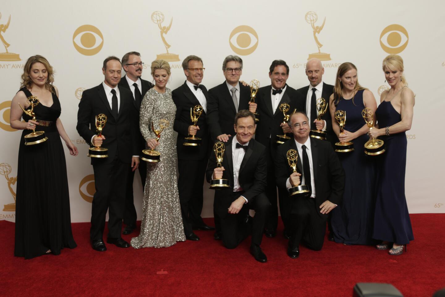 The "Breaking Bad" crew, winner of the drama series Emmy at the 65th Annual Primetime Emmy Awards, pose in the press room.