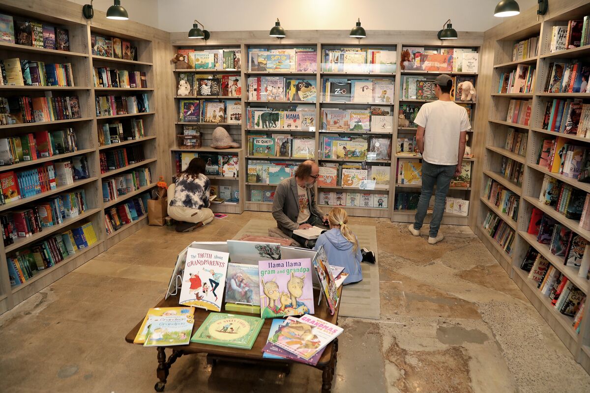 Visitors browse books at Lido Village Books in Newport Beach.