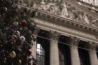 A Christmas tree stands in front of the New York Stock Exchange, Monday, Dec. 11, 2023, in New York. Wall Street is inching up modestly Wednesday ahead of a decision by the U.S. Federal Reserve on interest rates. (AP Photo/Yuki Iwamura)