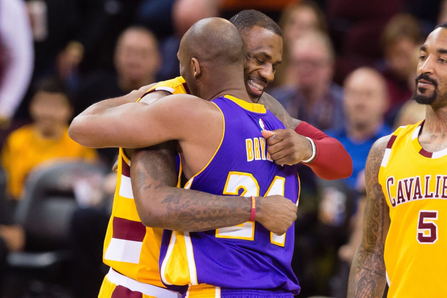 Kobe Bryant and LeBron James embrace before the Cavaliers hosted the Lakers on Thursday in Cleveland.