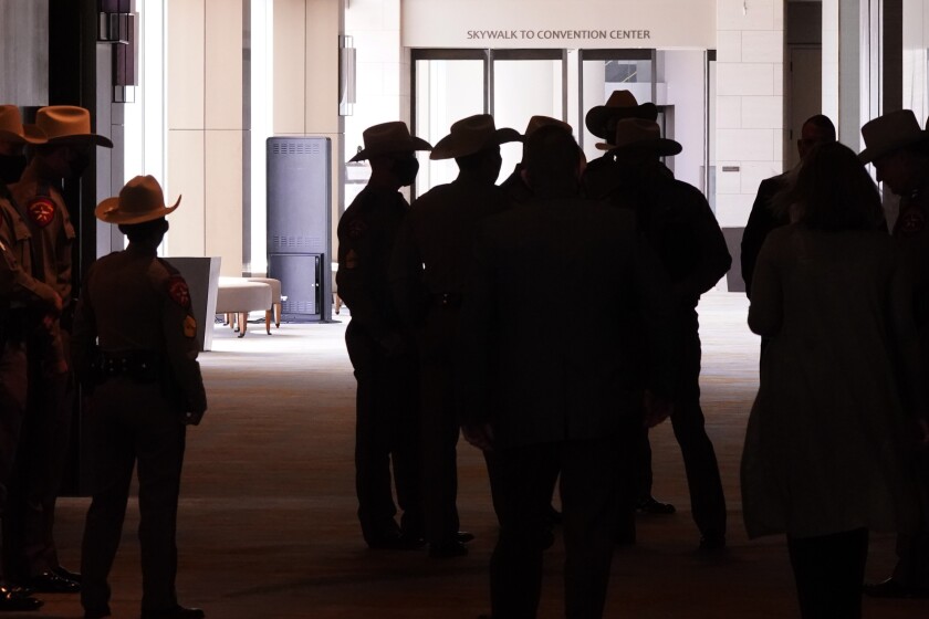 Texas DPS officers gather near the Dallas convention center
