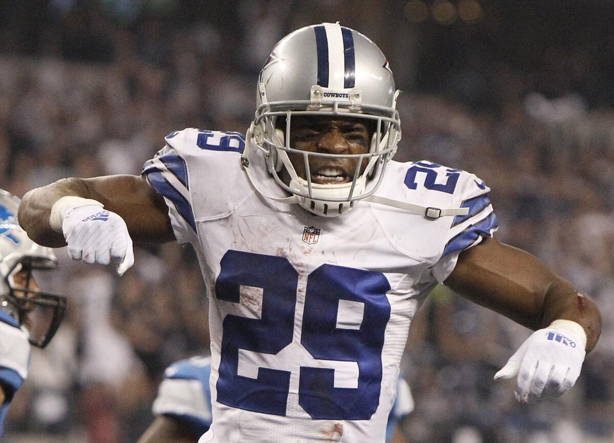 Dallas running back DeMarco Murray celebrates a touchdown during a wild-card playoff game against the Detroit Lions on Jan. 4.