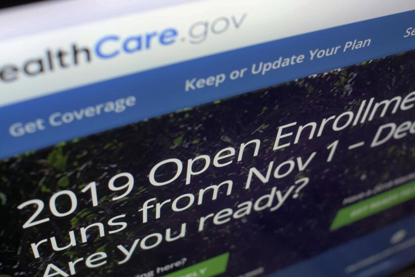 FILE - This Oct. 23, 2018 file photo shows HealthCare.gov website on a computer screen in New York. A federal judge's ruling that the Obama health law is unconstitutional has landed like a stink bomb among Republicans, who've seen the politics of health care flip as Americans increasingly value the overhaul's core parts, including protections for pre-existing medical conditions and Medicaid for more low-income people. (AP Photo/Patrick Sison)