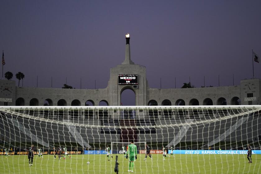 Mexico and Nigeria play the first half of their international friendly soccer match at Los Angeles Memorial Coliseum