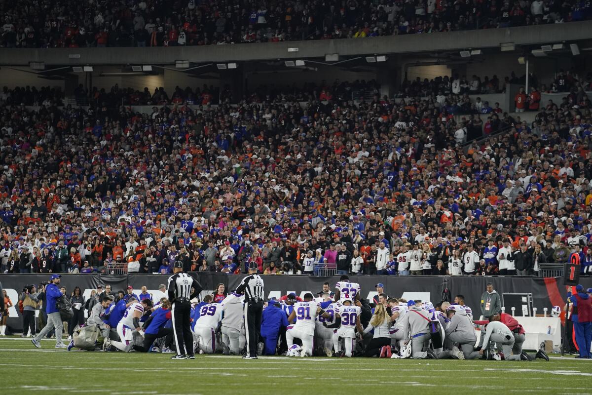 The Buffalo Bills players pray for teammate Damar Hamlin.
