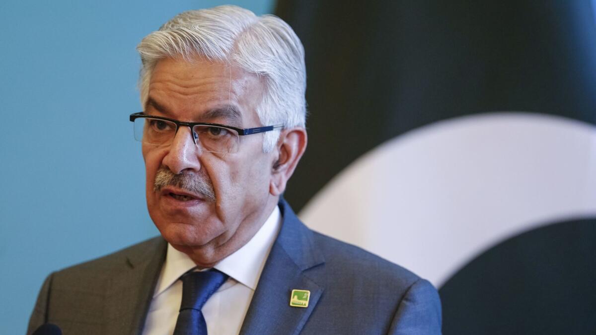 Pakistani Foreign Minister Khawaja Asif speaks during a news conference in Beijing on Dec. 26.