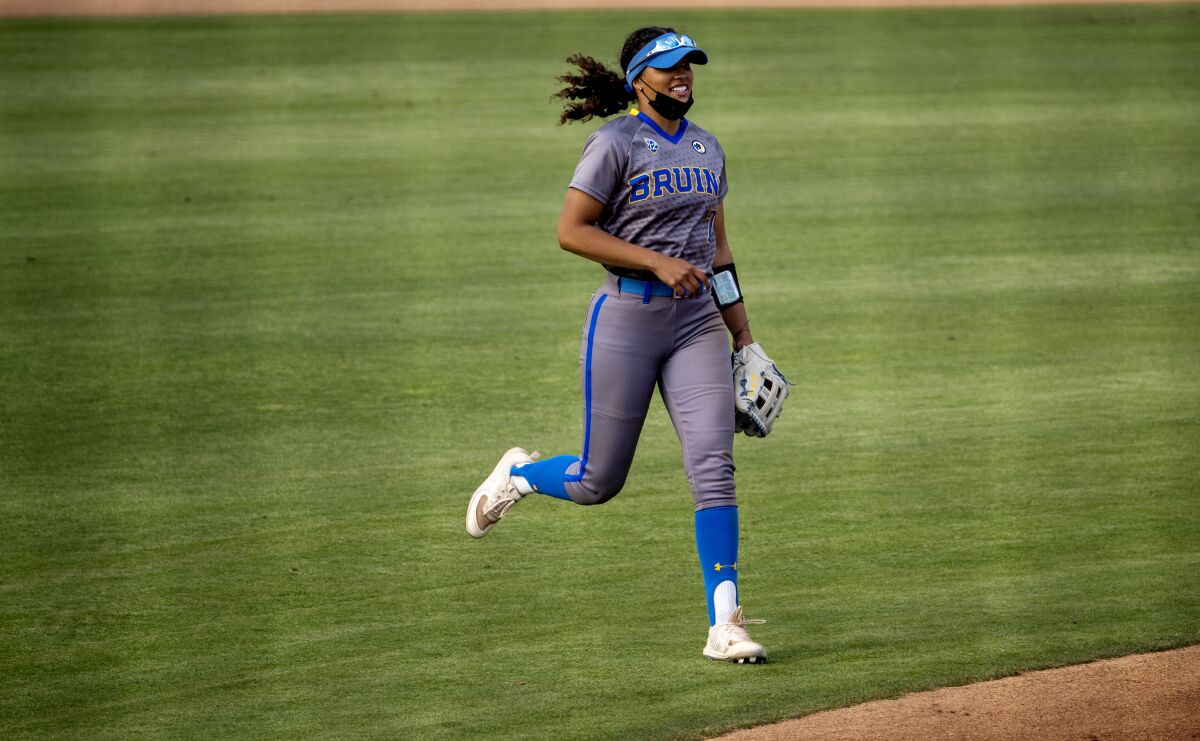 UCLA's Maya Brady runs in from center field during a game against Oregon State on April 16 in Westwood.