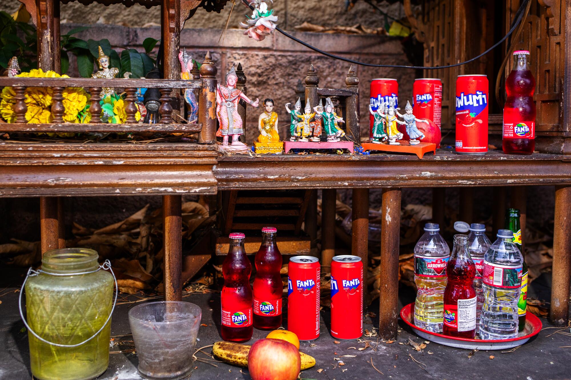 Red Fanta presented as an offering at the spirit houses at Silom Supermarket in Thai Town in Los Angeles.