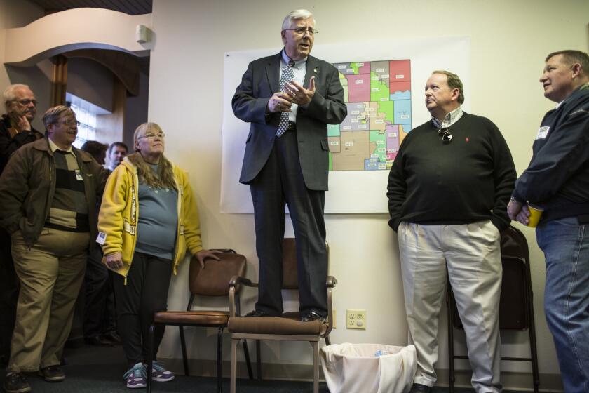 Sen. Mike Enzi (R-Wyo.) speaks to supporters this month at an open house marking the official opening of his campaign headquarters in Cheyenne.