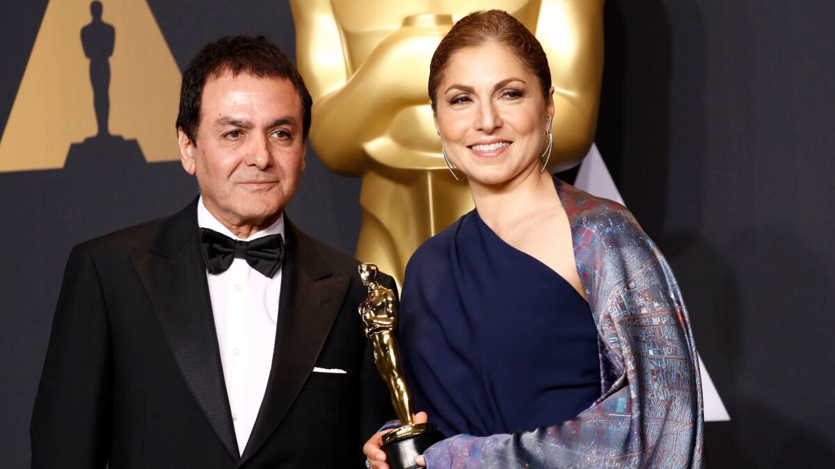 Anousheh Ansari and Dr. Dirouz Naderi accepted the award for Asghar Farad for the foreign film "The Salesman."
