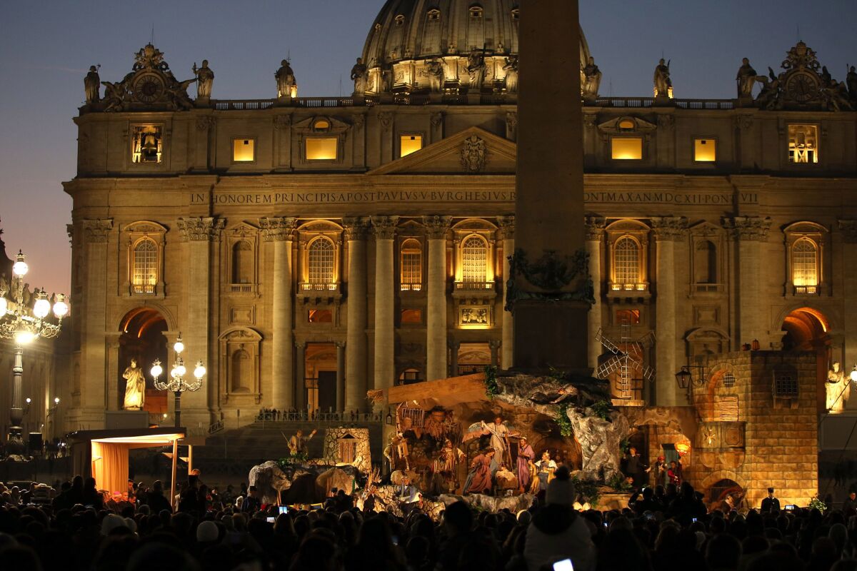 The Nativity scene in St. Peter's Square is lit up on Dec. 9, 2016, in Vatican City.