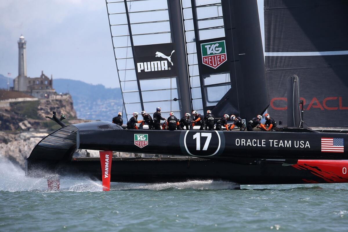 Oracle Team USA practices before the start of Louis Vuitton Cup semifinal race in San Francisco Bay on Friday.