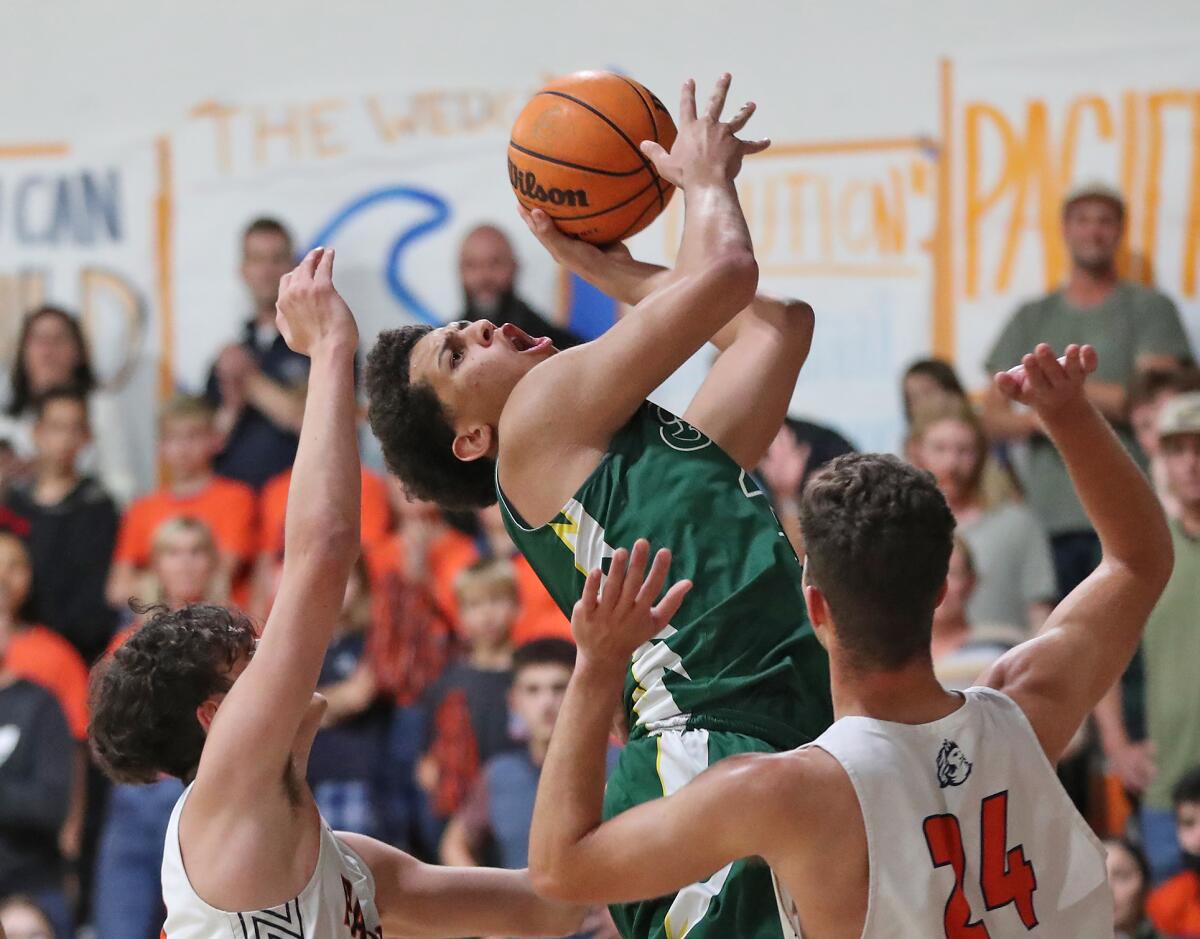 Edison's Trey Wilborn shoots during the quarterfinals of the CIF Southern Section Division 2A boys' basketball playoffs.