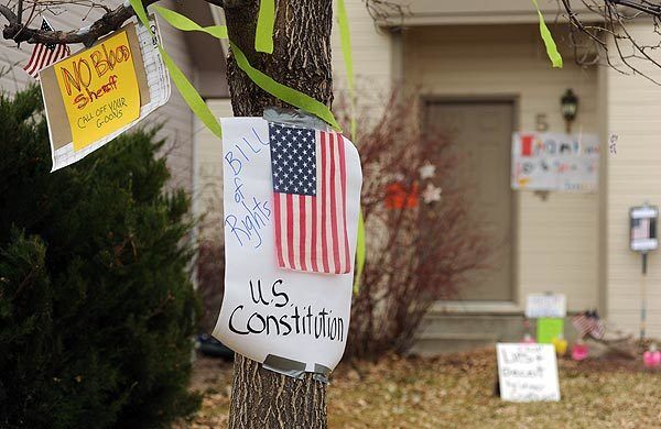 Signs of support adorn the outside of the Heene family home in October.