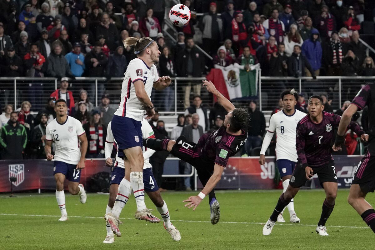 United States' Walker Zimmerman (3) heads