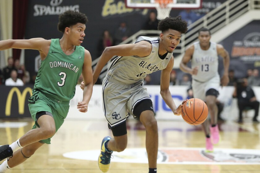 Sierra Canyon's Ziaire Williams goes against Dominican on Saturday during a high school basketball game at the Hoophall Classic.