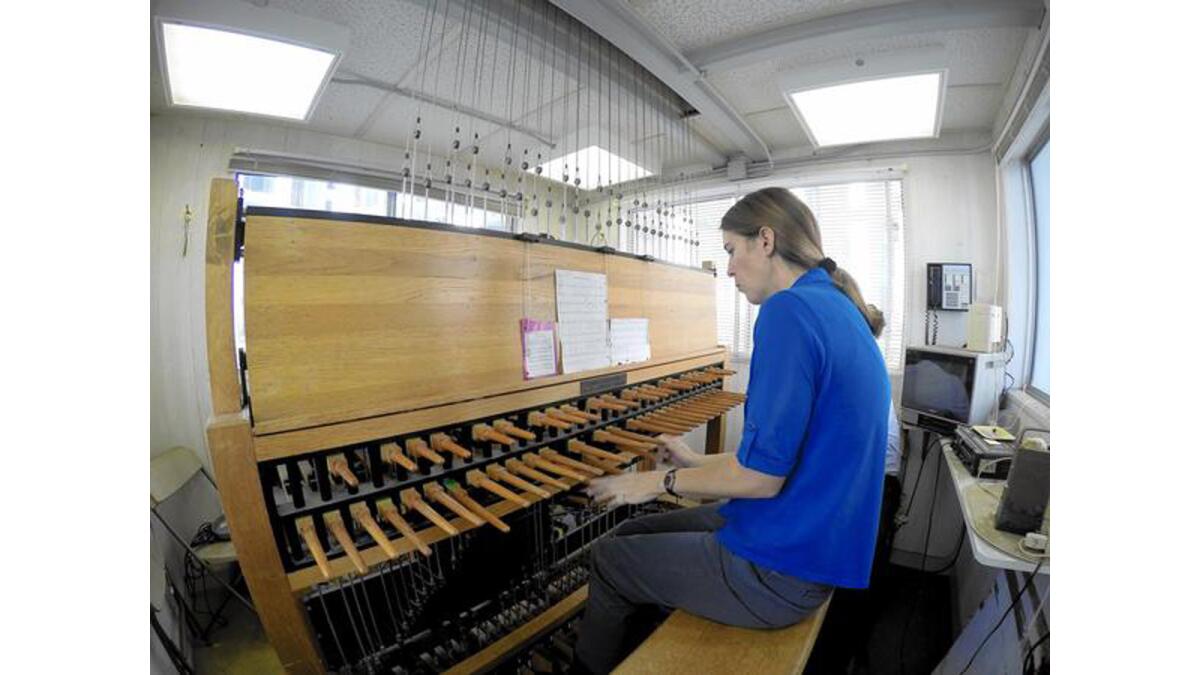 Melissa Weidner plays the Arvella Schuller Carillon inside the Crean Tower at Christ Cathedral in Garden Grove. Only five such instruments exist in California, and there are fewer than 200 across the U.S.