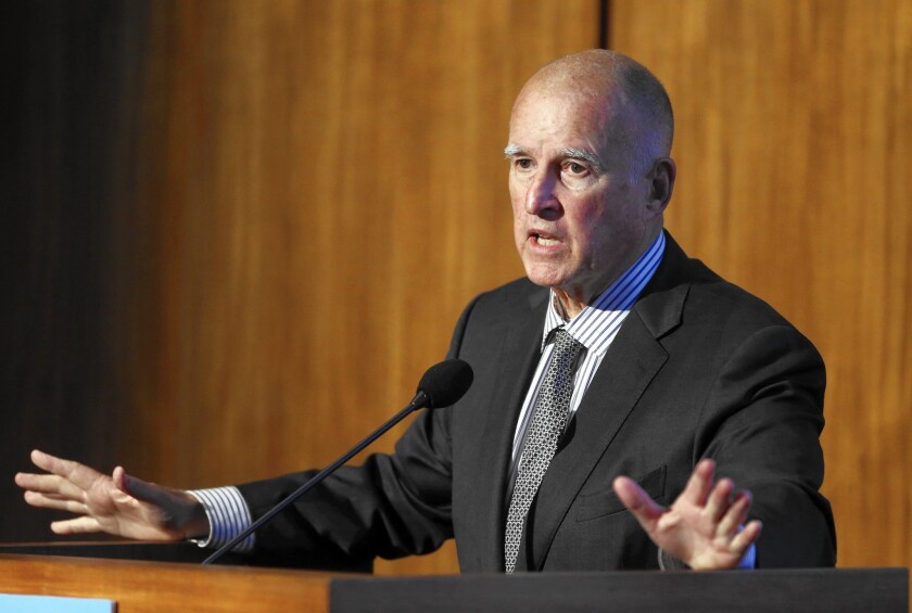 Gov. Jerry Brown speaks at a climate change summit at UC San Diego. California's Democrats are led by Brown, who, while liberal in some respects, has served as a brake on more leftward elements of his party.