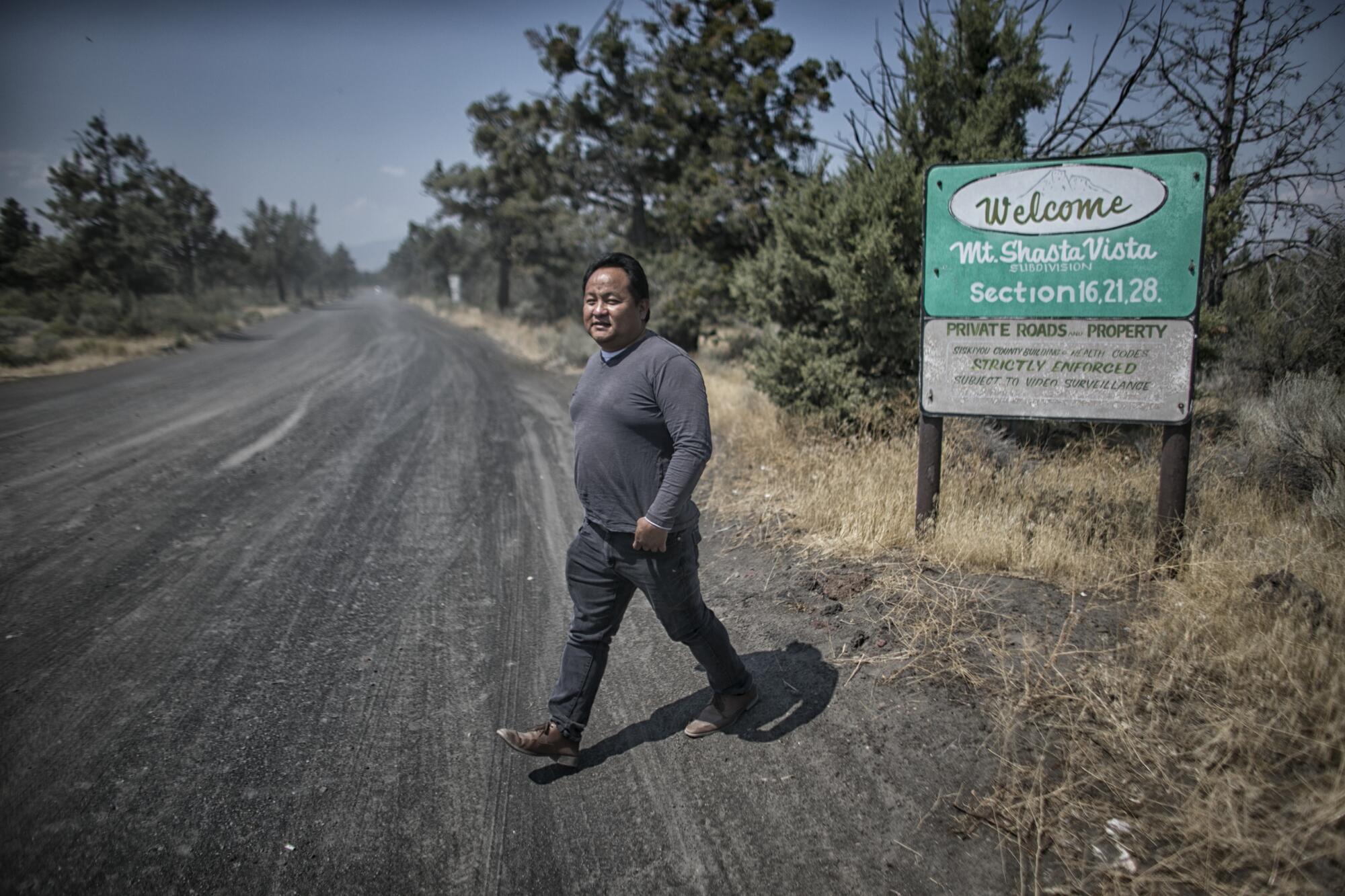 Mouying Lee walks near an entrance to Mount Shasta Vista.