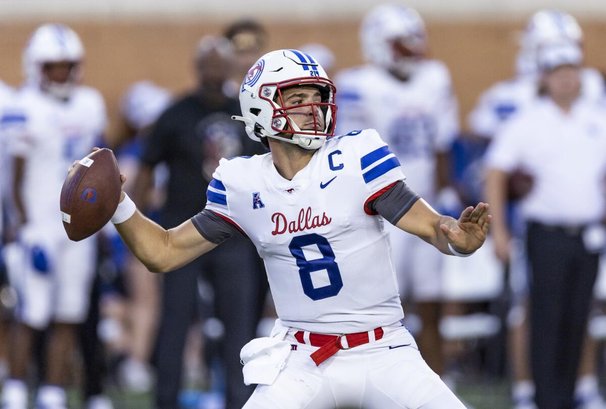FILE - SMU quarterback Tanner Mordecai throws a pass during the team's NCAA football game against North Texas on Sept. 3, 2022, in Denton, Texas. SMU won 48-10. Mordecai formerly played at Oklahoma. (AP Photo/Brandon Wade, File)