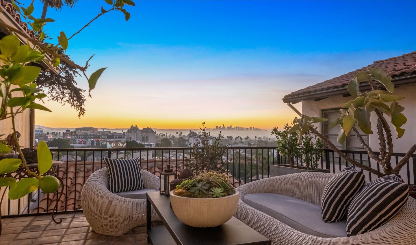 Built in 1931, the three-story home holds four bedrooms, 3.5 bathrooms, scenic living spaces and a den with a movie theater and wet bar.