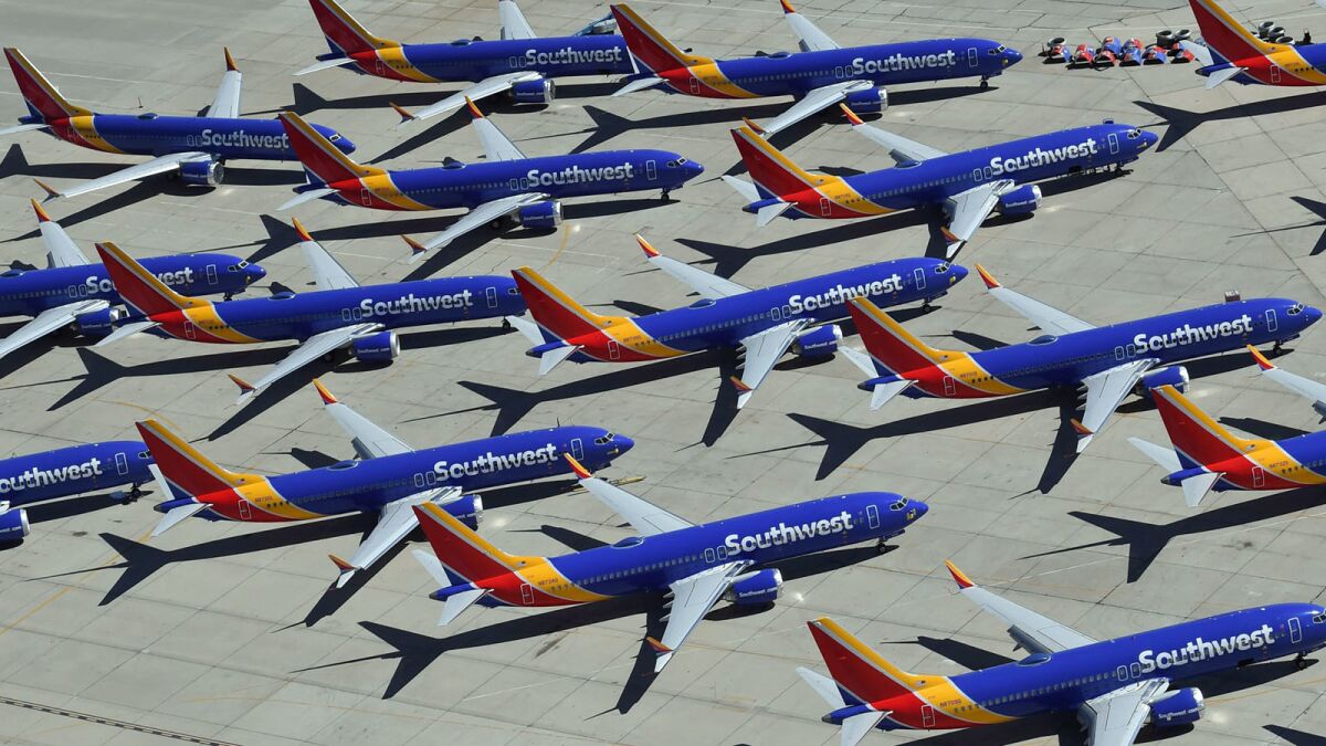 Southwest Airlines Boeing 737 Max aircraft are parked on the tarmac in March after being grounded at the Southern California Logistics Airport in Victorville.