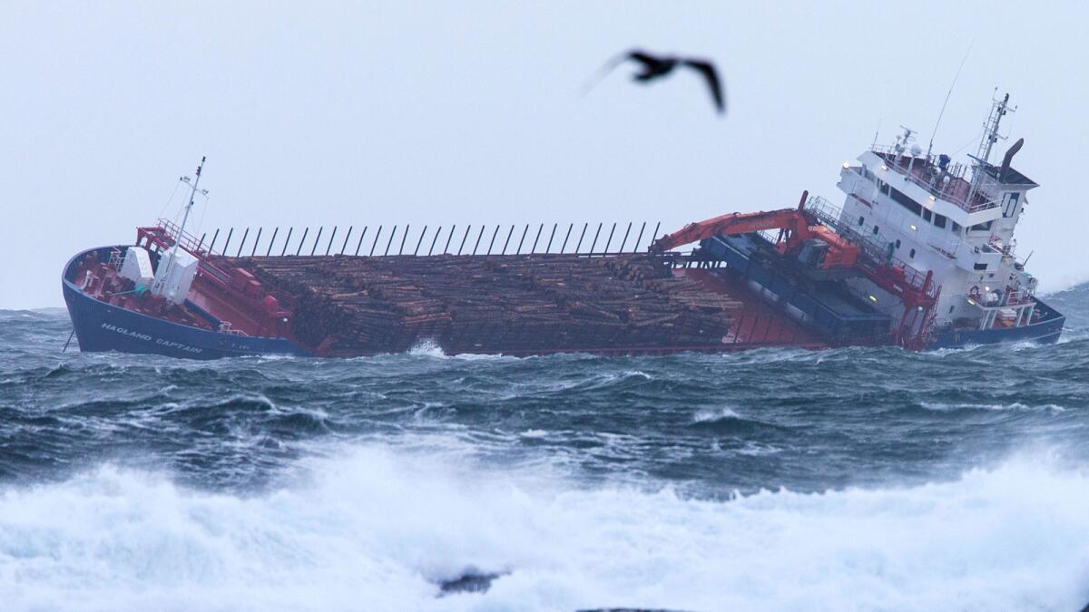 The anchored Hagland Captain rolls in rough seas Sunday in the same area as the cruise ship Viking Sky.