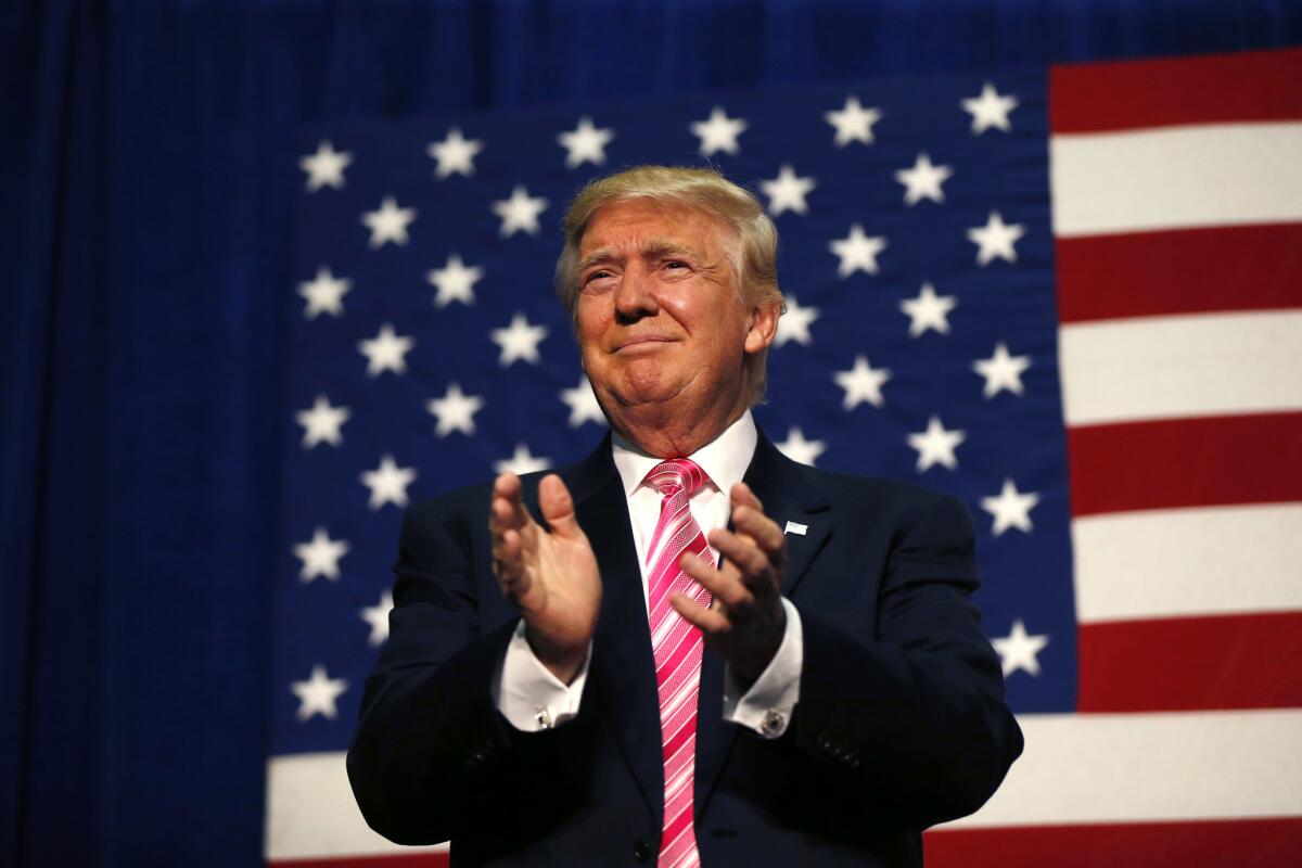 Republican presidential candidate Donald Trump arrives to speak at a campaign rally in Fredericksburg, Va. on Aug. 20.