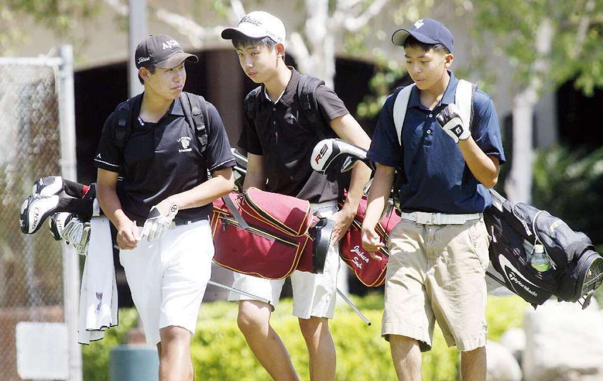ARCHIVE PHOTO: LA Cañada High's Collin Morikawa, from left, Joshua Suh and Crescenta Valley's Paul Park all received All-Area Boys' Golf honors.