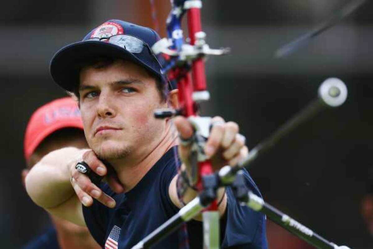 Jake Kaminski of the U.S. competes in the men's team archery medal round.