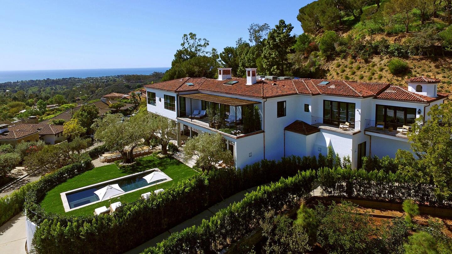 The contemporary Mediterranean is built on the site of a onetime home of Ronald and Nancy Reagan in Pacific Palisades.