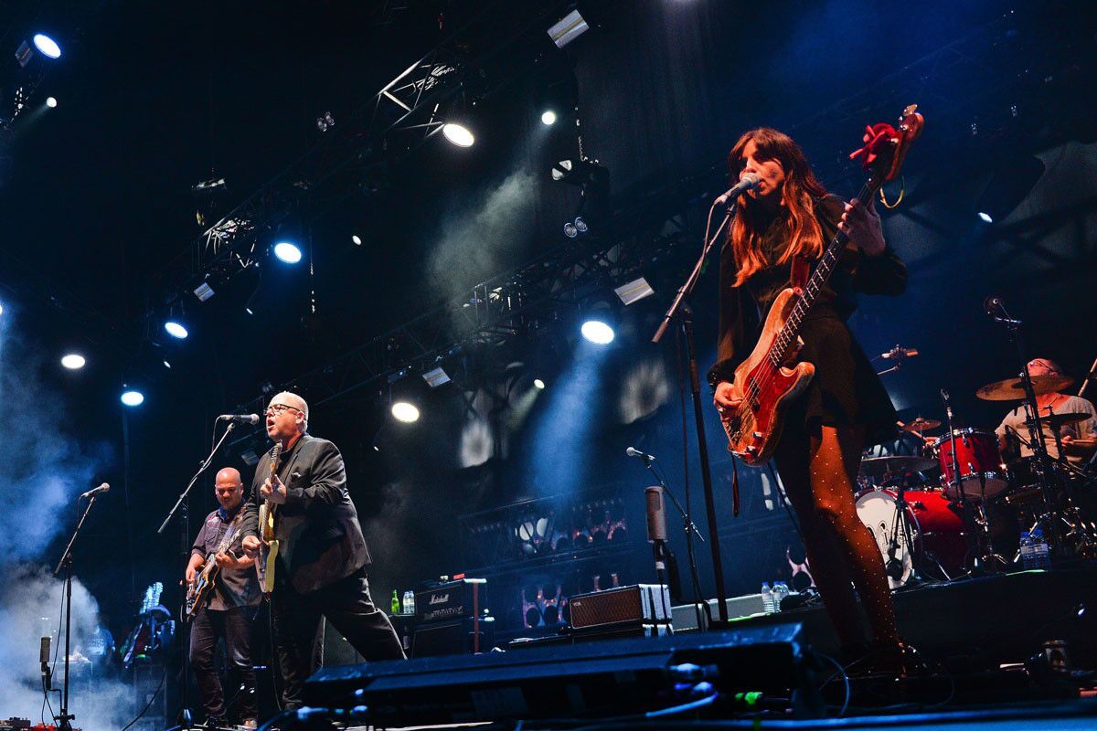 Pixies lead singer Frank Black (center) and bassist Paz Lenchantin. (Patricia De Melo Moreira/AFP/Getty Images)