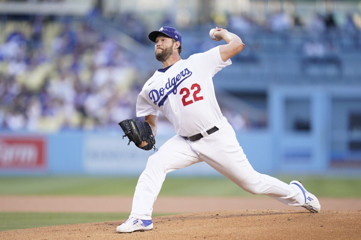 Los Angeles Dodgers starting pitcher Clayton Kershaw (22) throws during the first inning of a baseball game against the Chicago Cubs in Los Angeles, Saturday, July 9, 2022. (AP Photo/Ashley Landis)