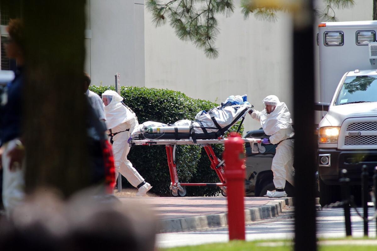 Nancy Writebol, an American aid worker infected with Ebola while working in West Africa, arrives at Emory University Hospital in Atlanta, Ga., in early August.