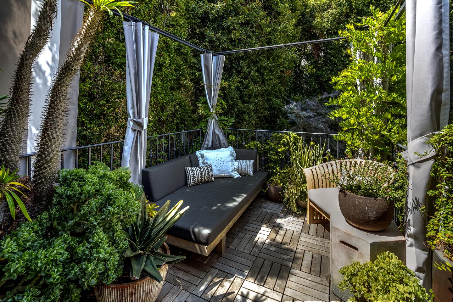 The home's backyard was designed as a series of small outdoor rooms.