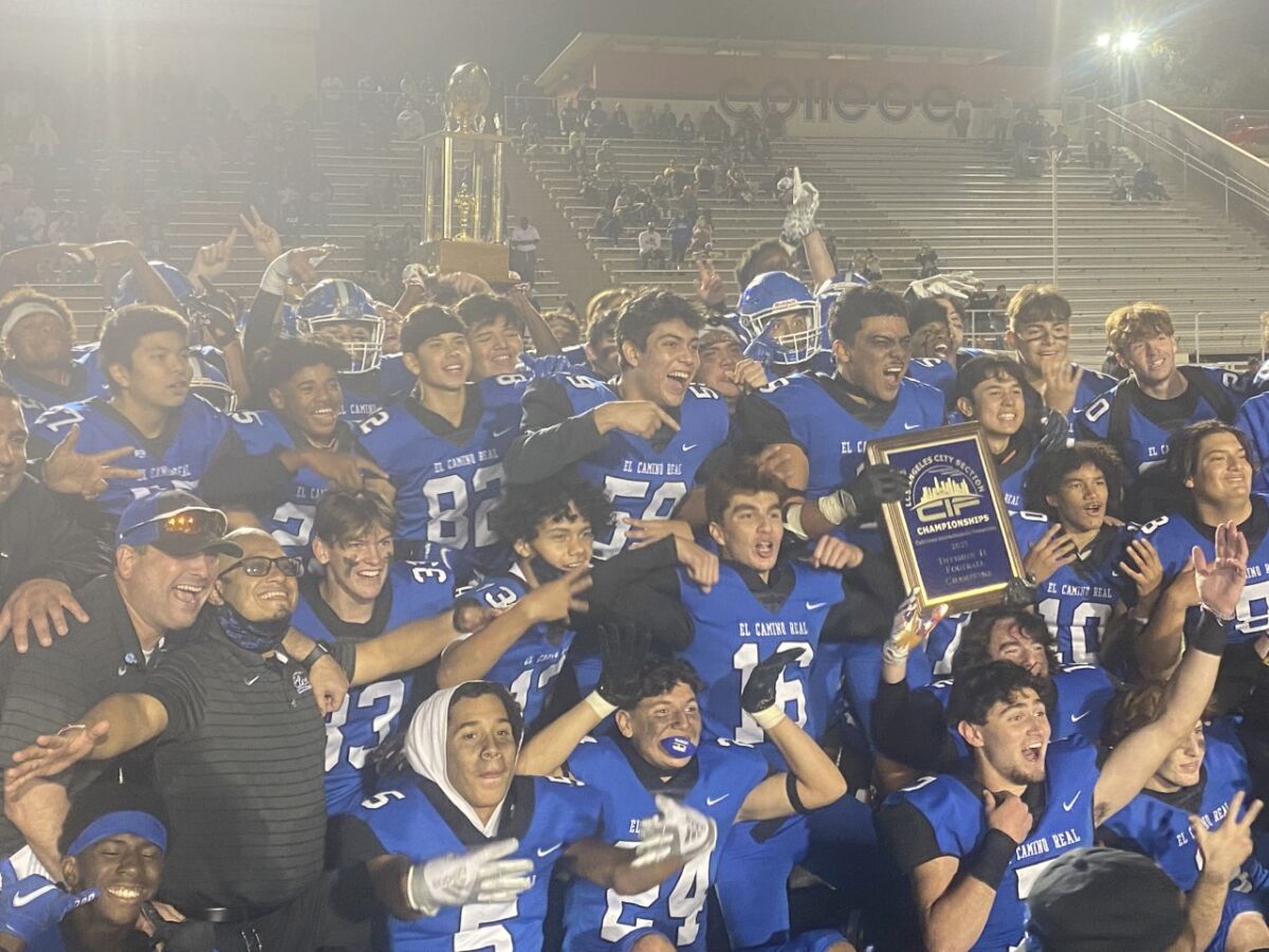 El Camino Real players celebrate after their 37-18 victory over L.A. Hamilton.