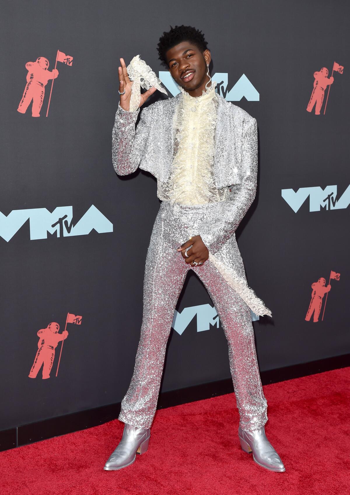 Lil Nas X in a custom Christian Cowan outfit on the red carpet at the 2019 MTV VMAs.