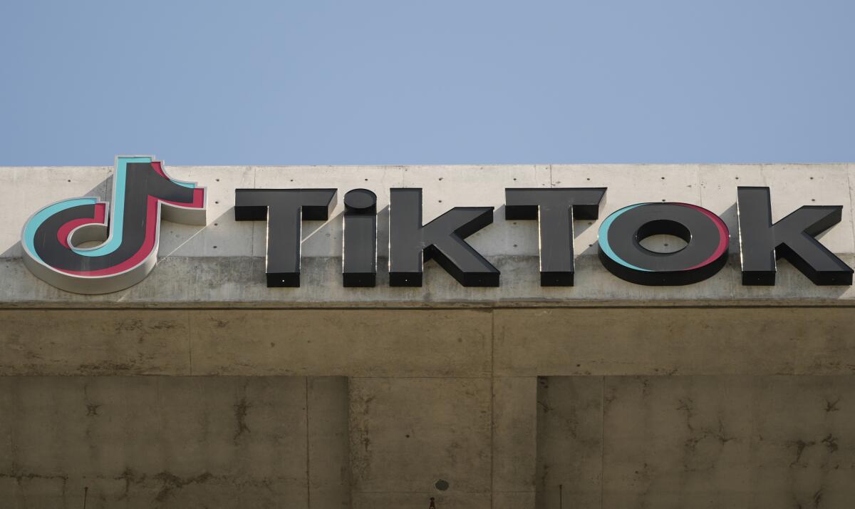 A TikTok sign on a building. 