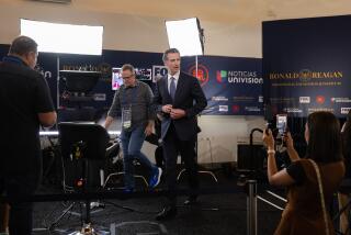 SIMI VALLEY, CA - SEPTEMBER 27: California Gov. Gavin Newsom prepares for a television interview at the second GOP debate at the Ronald Reagan Presidential Library in Simi Valley, CA on Wednesday, Sept. 27, 2023. (Myung J. Chun / Los Angeles Times)
