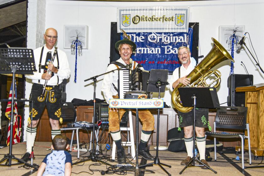 “The Original German Band” entertained Oktoberfest attendees. Members are Jim George on clarinet, Howard Kantorowski on accordion and Ty Rust on tuba.