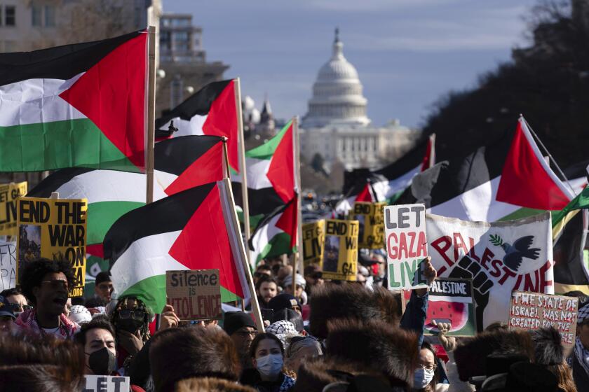 FILE - Demonstrators rally during the March on Washington for Gaza at Freedom Plaza in Washington, Jan. 13, 2024. Thousands of protestors are expected to rally in the nation's capital Saturday, May 18, in support of Palestinian rights and demanding an immediate end to the punishing Israeli military operations in the Gaza Strip. The annual event commemorates the 76th anniversary of what is known in Arabic as The Nakba (The Catastrophe), the creation of the state of Israel in 1948. (AP Photo/Jose Luis Magana, File)