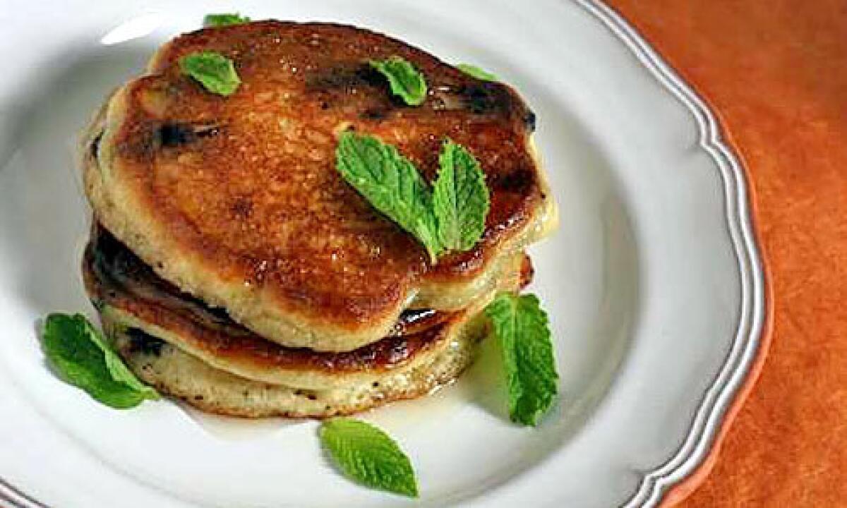 The unexpected: Olive oil pancakes studded with Spanish chocolate.