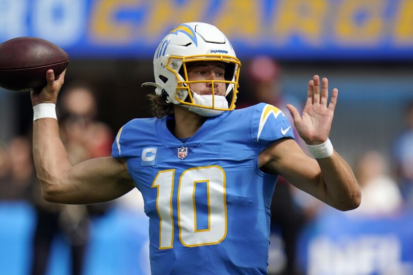 Los Angeles Chargers quarterback Justin Herbert throws during an NFL football game.